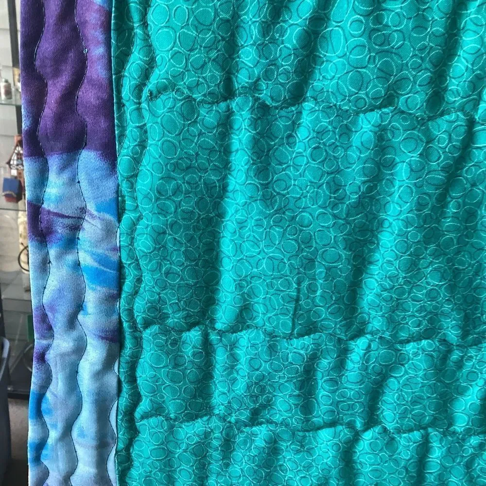 NWT. Hand Crafted Patchwork Quilt with Blues, Purples and Teals Accents